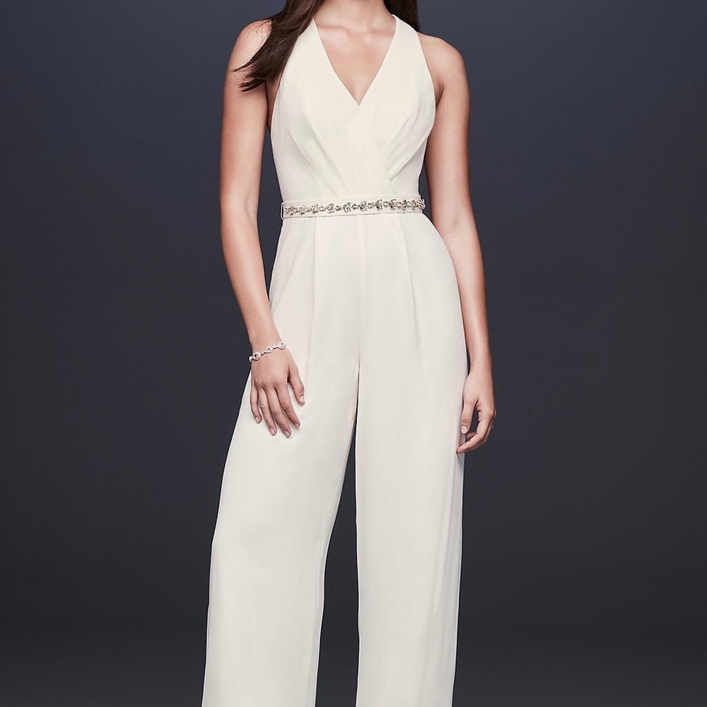 Never worn (tags on) ivory jumpsuit.